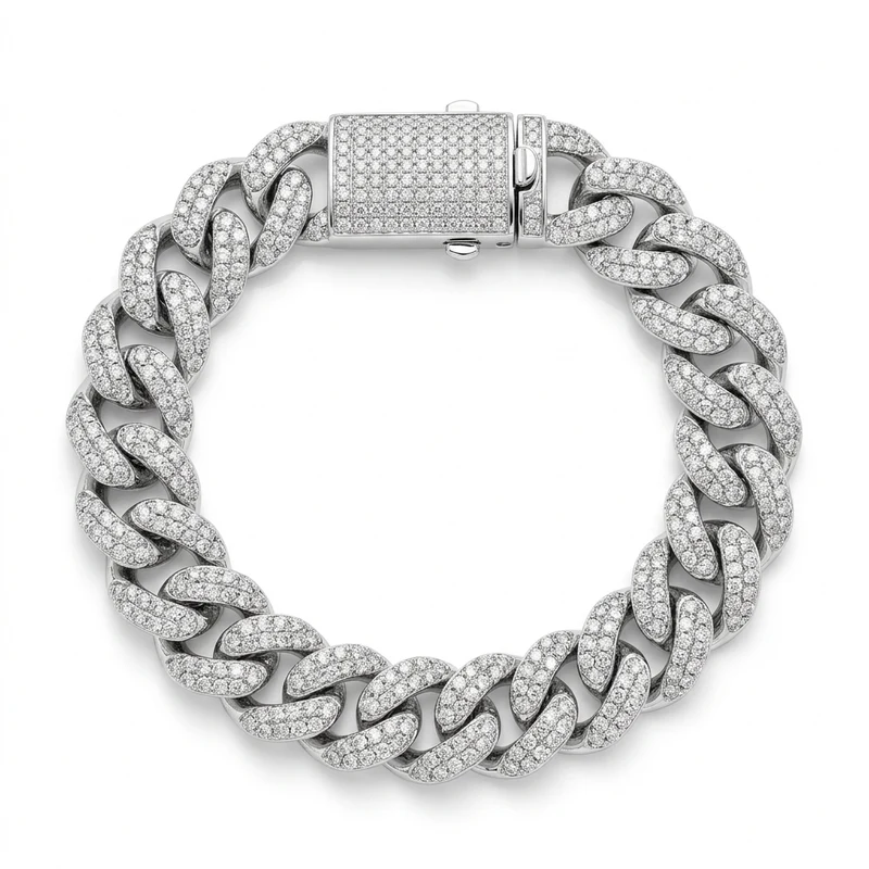 White-gold diamond pavé curb link bracelet with diamond box clasp on pure white.